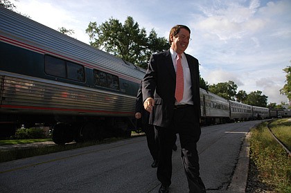 Photo by: Isaac Babcock - Orange County Commissioner Bill Segal steps off the Amtrak train recently. Officials came out in support of SunRail earlier this year.