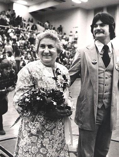 Photo by: Courtesy of University  Of Central Florida - Rita Reutter was the nation's oldest homecoming queen at 58-years-old, escorted by Lee Constantine in this 1977 photo, before he became a state senator and county commissioner.