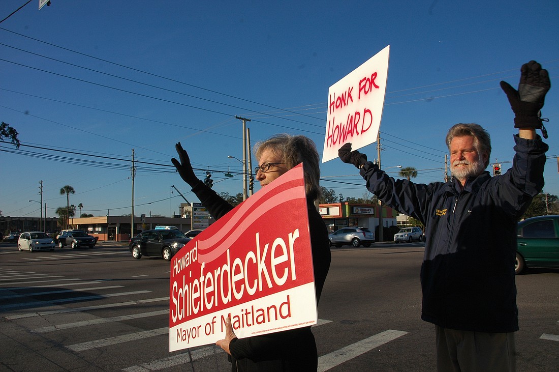 Photo by: Isaac Babcock - Howard Schieferdecker campaigns for mayor at the corner of Horatio and Orlando avenues on Monday.