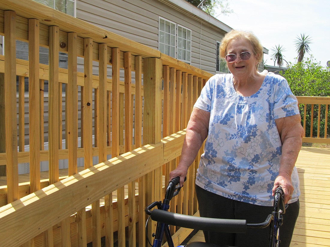 The team of RLF and Allan & Conrad donated more than $3,000 and provided design and volunteer services to help build a handicap ramp for a 77-year-old resident.