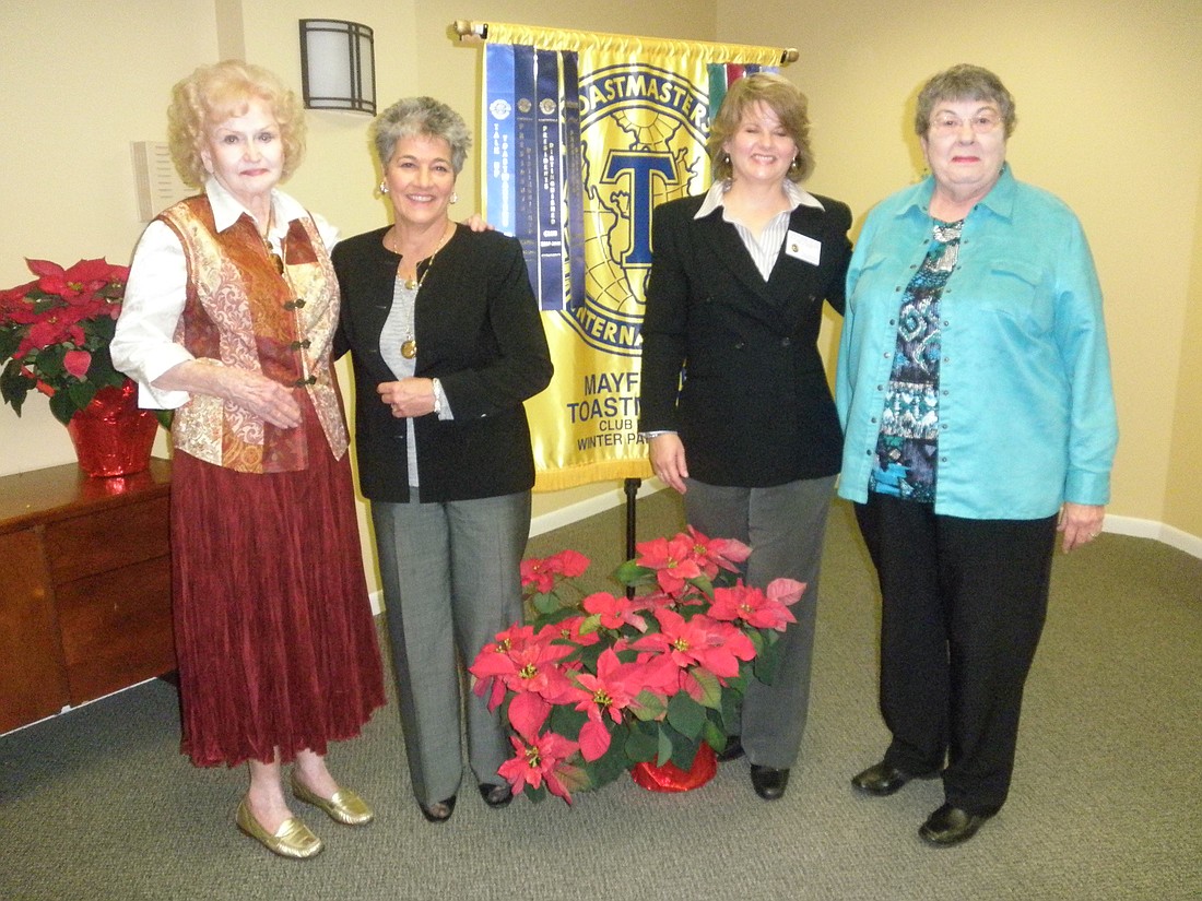 Photo by: Brittni Larson - Mayflower Toastmasters members BJ McKee, from left, Shelley Dittmer, Carolyn Behling and Margaret Harris pose at the Mayflower Retirement Community on Dec. 31.