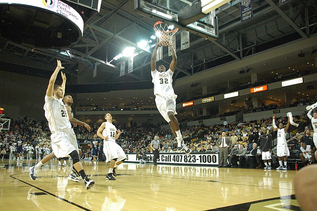 Photo by: Isaac Babcock - In their first two games of the season, UCF has blown out opponents by a combined score of 195-100. Guard/Forward Isaiah Sykes scores against Jackson State in their game on Monday night.  The Knights defeated the Tigers 80-39.