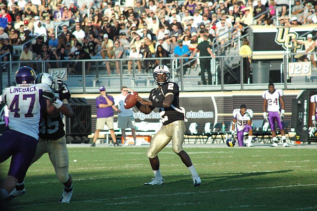 Photo by: Isaac Babcock - UCF quarterback Jeff Godfrey threw for 159 yards and rushed for 43 yards.