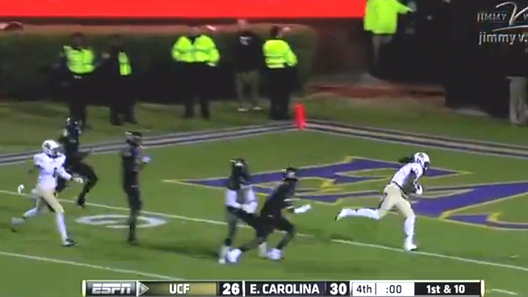 Photo by: Isaac Babcock - UCF receiver Breshad Perriman snags the game-winning hail mary to beat ECU in dramatic fashion, securing a share of the American Athletic Conference championship Thursday night.