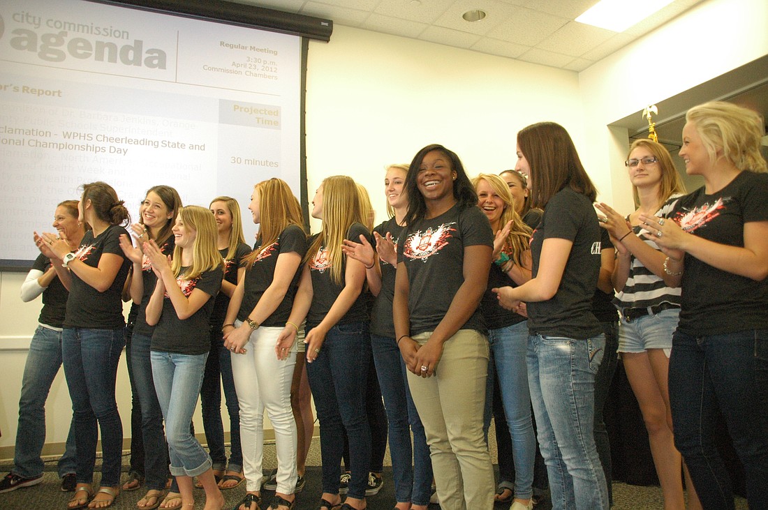 Photo by: Isaac Babcock - Winter Park High School cheerleaders were honored April 23 by Mayor Ken Bradley for winning back to back state championships.