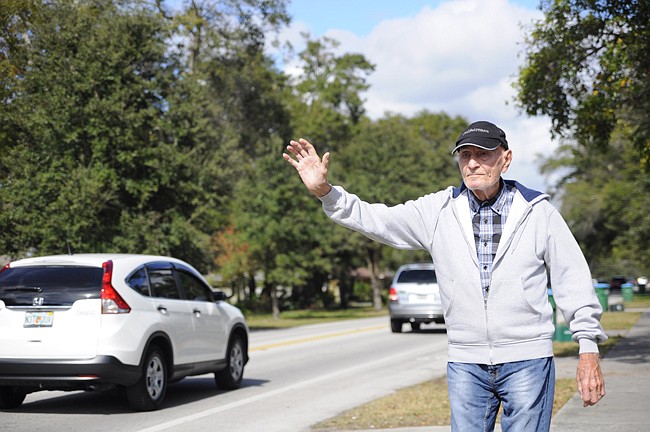 Photo by: Isaac Babcock - In recent weeks, locals noticed that the waving man known as "Lakemont Jack" had gone missing from his usual post on Lakemont Avenue.