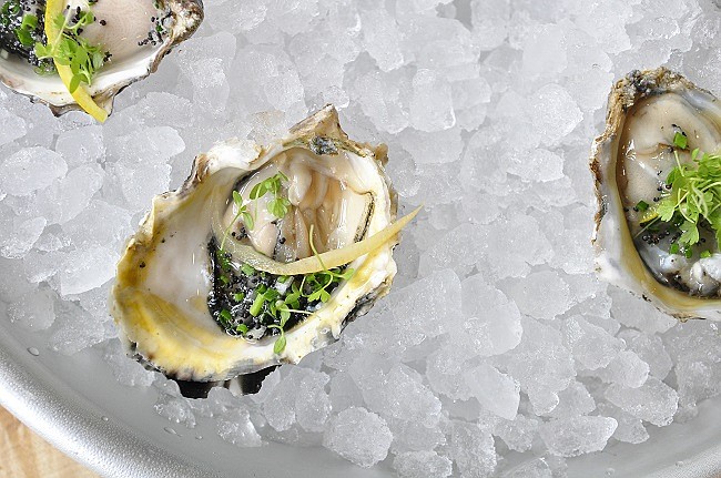 Photo by: Isaac Babcock - Three kinds of oysters prepared for multi-sensory appeal are part of an ever-shifting menu at Baldwin Park's newest restaurant, founded by neighboring Seito Sushi's Jason and Sue Chin.