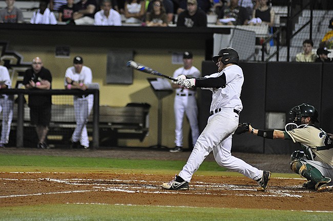 Photo by: Isaac Babcock - The Knights' bats exploded against the Big Red, finding 16 runs in a shutout hitting clinic Sunday. The win helped to right UCF's up-and-down season. They travel for a series in Memphis on Friday.