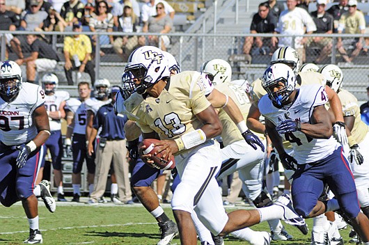 Photo by: Isaac Babcock - Justin Holman could lead the newly ranked Knights onto the field at Missouri this Saturday.