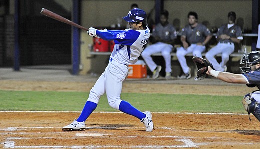 Photo by: Isaac Babcock - Seong-hun Kim rips a drive in the series opener between the Florida Collegiate Summer League and the Korean National Collegiate Team.