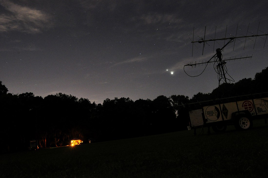 Photo by: Isaac Babcock - A satellite antenna searches for radio stations on the other side of the continent at the American Radio Relay League's Field Day June 28-29.