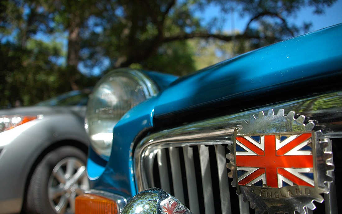 Photo by: Isaac Babcock - Blasts from the past and some modern oddities dotted the grass of Mead Garden Saturday, as British car aficionados crammed more than 100 cars into one space to celebrate the delightful quirks of motoring's English past, and t...