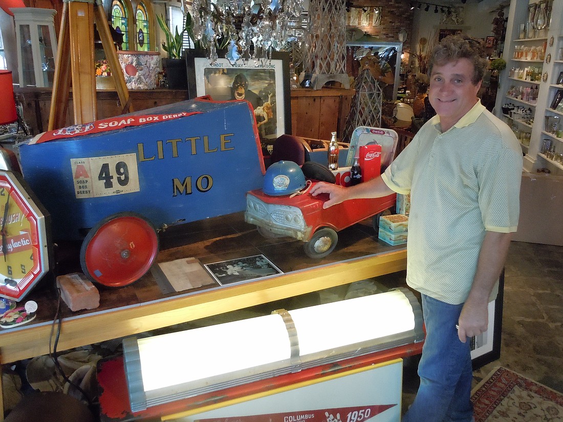 Photo by: Clyde Moore - Craig Tremblay, pictured, and friend Judith Giraulo own Entwined, which recently opened along Fairbanks Avenue in the former Pittsburgh Paint and Glass building.