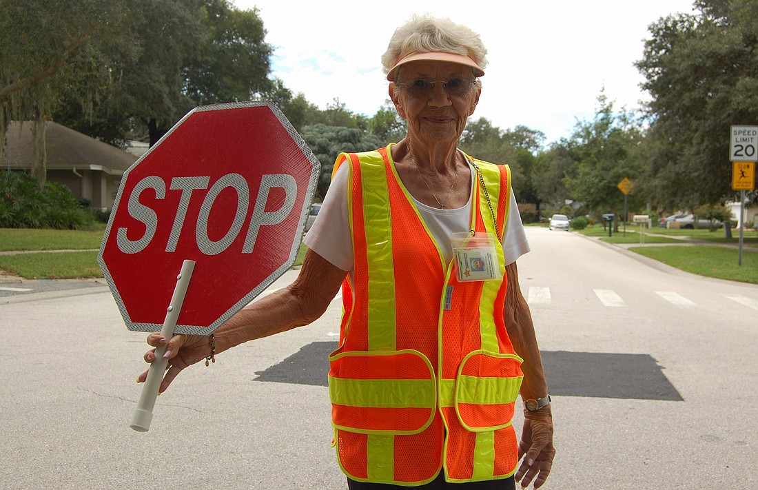 Photo by: Tina Russell - Winter Springs crossing guard Ethel Bonura started her job just to pass time. Twenty-five years later, she is changing families' lives and loving it.