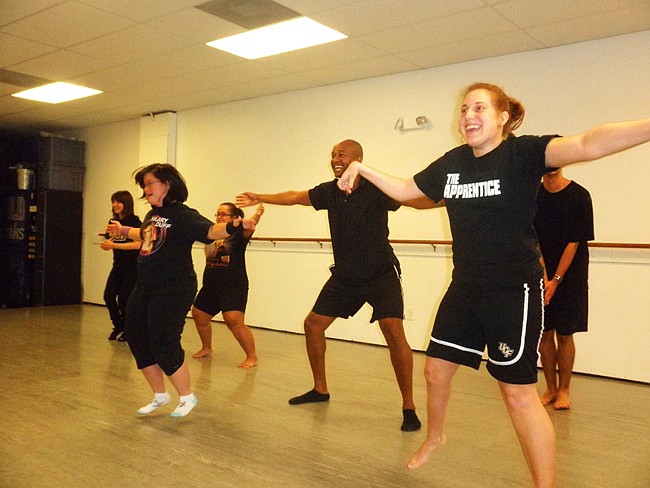 Photo by: Brittni Larson - Center For Contemporary Dance Artistic Direct Dario Moore, center, uses dance as therapy for students with autism, cerebral palsy and Down syndrome.