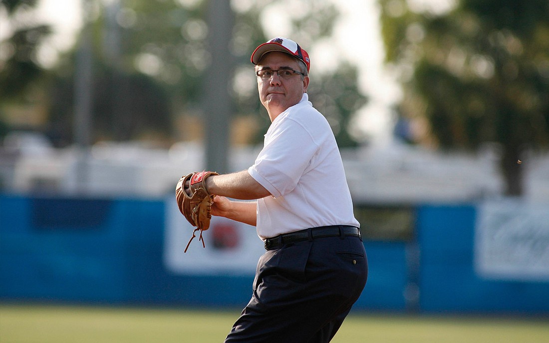 Photo courtesy of Florida Collegiate Summer League - Winter Park Mayor Ken Bradley throws the ceremonial first pitch at the Winter Park Diamond Dawgs' home opener on June 4.