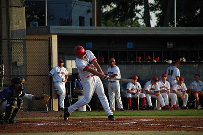 Photo by: Isaac Babcock - Only one run would separate the Diamond Dawgs from the Lightning in the championship game, as a pitchers' duel kept things close through all nine innings.