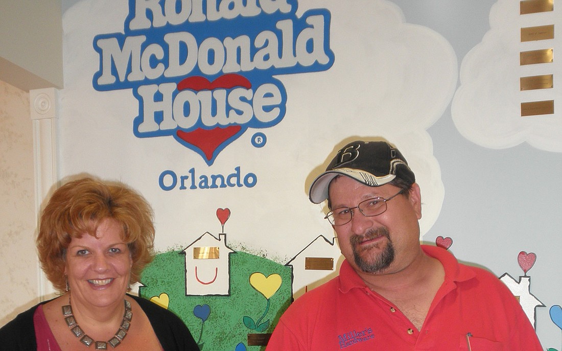 Photo courtesy of Ronald McDonald House - Rhonda and Bob Canfield pose with daughter Olivia. The Ronald McDonald House has housed them for six months total at treatment centers around the country.