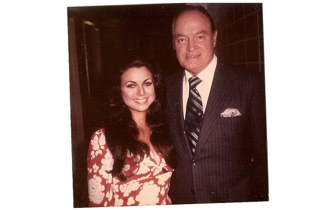 Helena Jackman poses with Bob Hope. The two worked together as entertainers, performing for a variety of audiences including Air Force recruits.