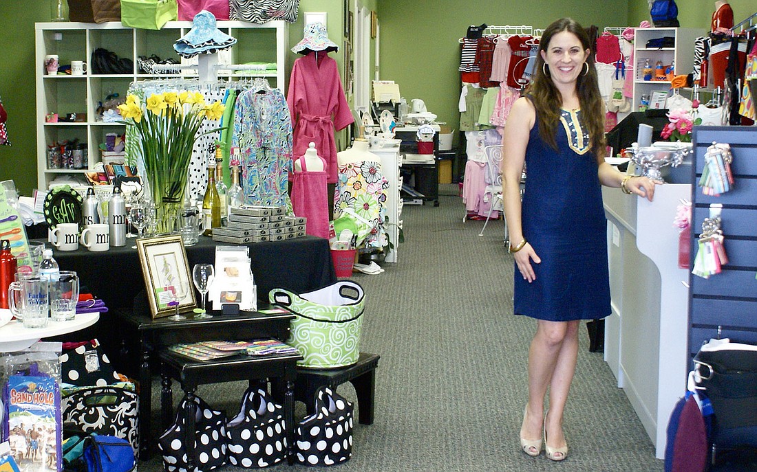 Photo by: Amy Simpson - Leisa Covelli shows off her Fern Park shop, which sells and displays the work of local entrepreneurs as well as her personalized merchandise.