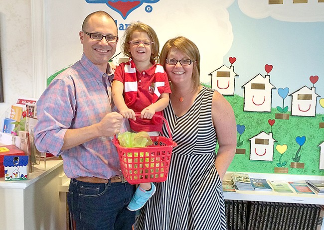 Photo by: The Cohens - Jason and Angela Cohen encourage their 3-year-old daughter Quinn to get involved in volunteering.