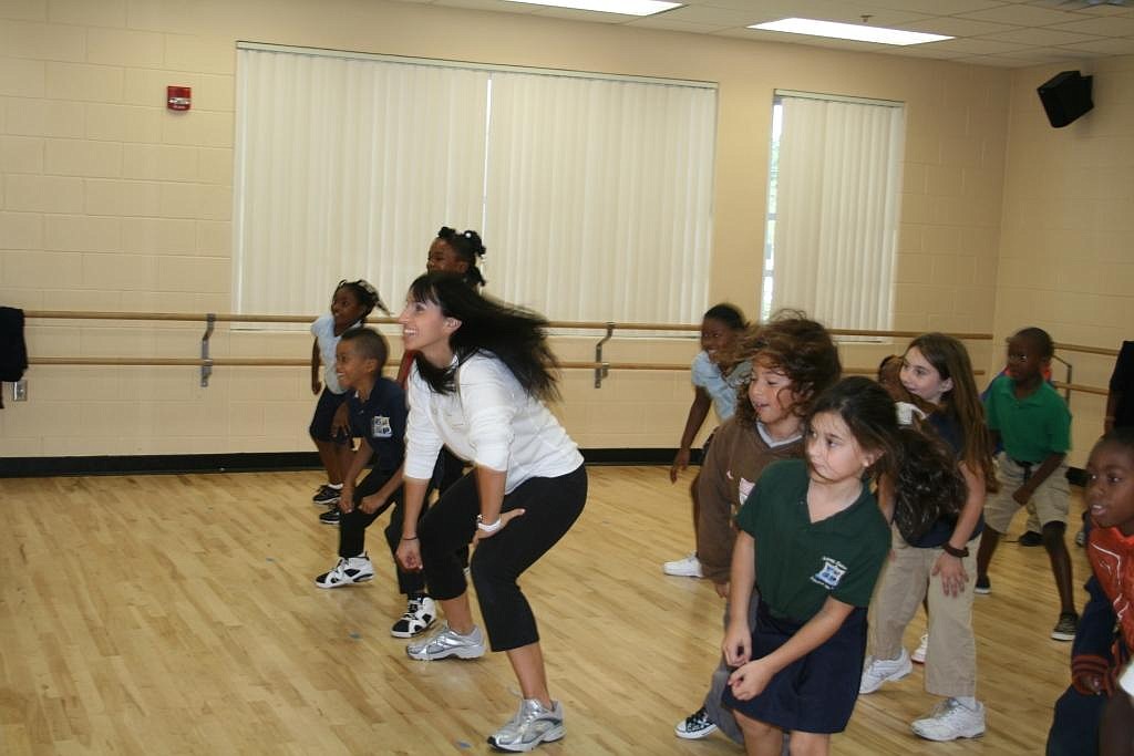 Winter Park resident Bianca Khoury Rey, owner and dance instructor at Turning Pointe Dance Studio in Longwood, showed students at Midway Elementary School of the Arts in Sanford some hip-hop moves during the teach-in event last month.