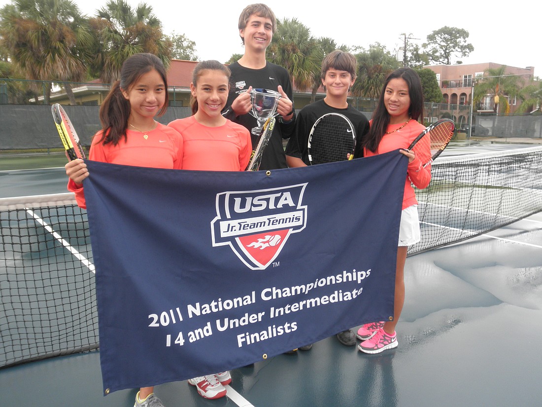Photo by: Brittni Larson - The Acers, Cecilia Tong, Kaylan Rotman, Ben Sephton, Nat Saffran and Theressa Tong, with their USTA Jr. Team Tennis National Championships trophy and banner. They got second place out of 8,000 teams at the competition last O...