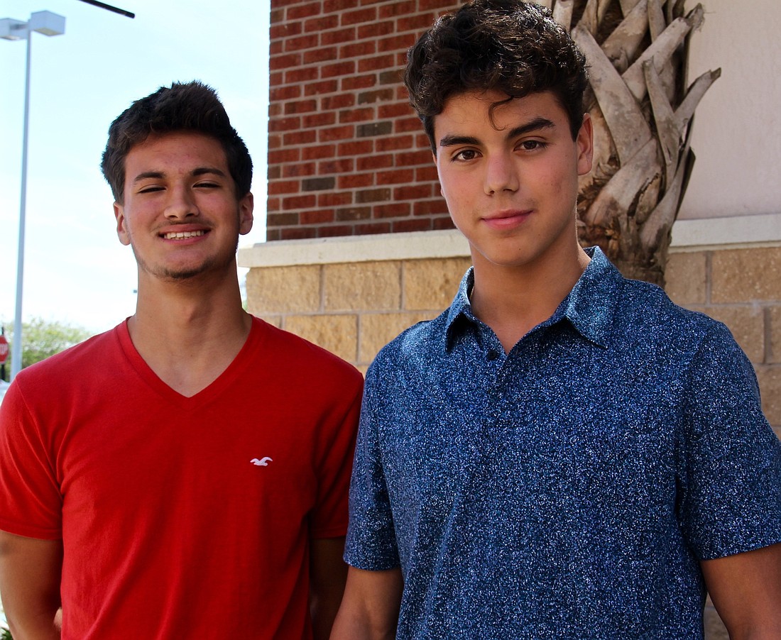Luis Varona, left, and Juan Pedraza, right, started their own business, LJ Services, a month ago.