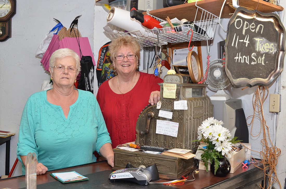 Judy Bergmeier, left, and Jennifer Page are closing Pageâ€™s Pastiques after 28 years in the same location on Tildenville School Road in Winter Garden.