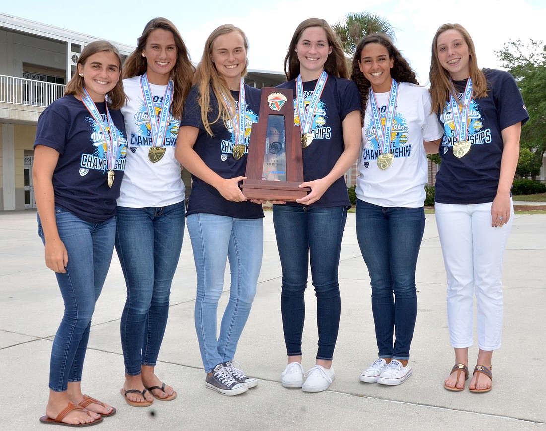 Olympia water polo seniors Grace Whidden, left, Leila Sorrells, Jillian Delisle, Claire Ewoldt, Marcela Herrera and Kaley Hopegill achieved their dream of winning a state championship this past weekend.