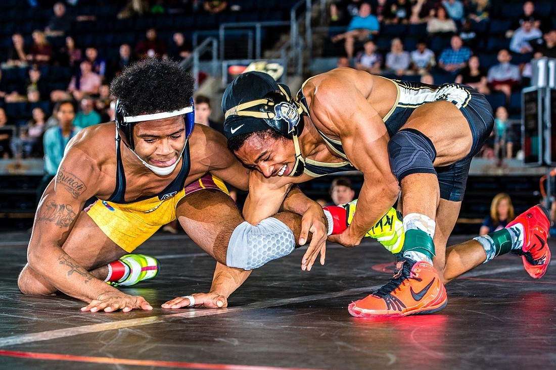 Justus Griffith, right, defeated Darius Bunch in the championship match at NCWA Nationals in March. Courtesy photo