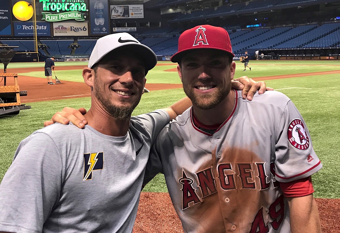 West Orange baseball coach Jesse Marlo is all smiles with his former star player Nolan Fontana after Fontanaâ€™s Major League debut for the Los Angeles Angels May 22 against the Tampa Bay Rays.