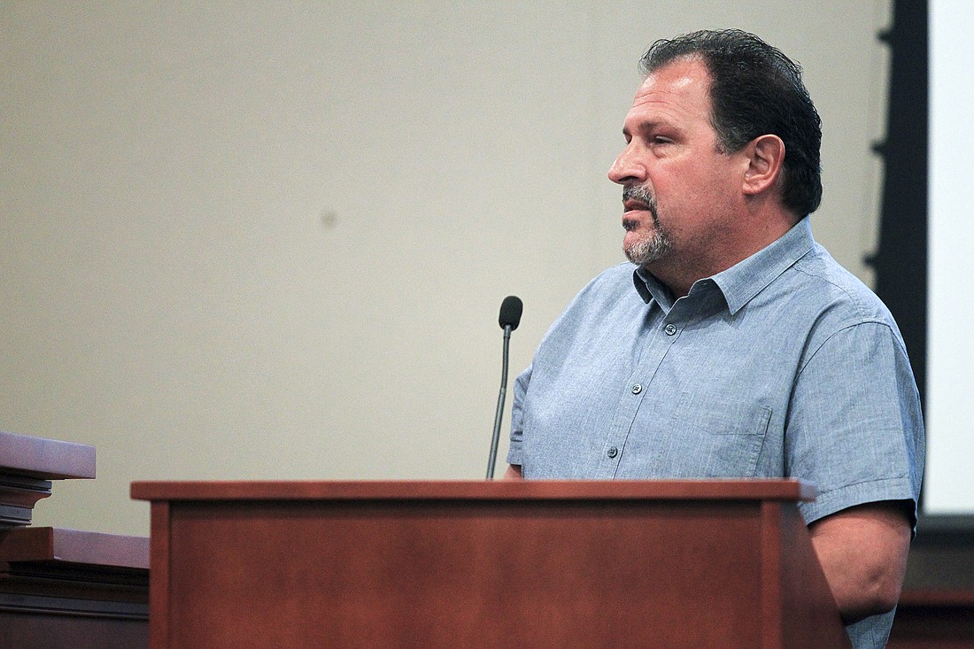 Richard Pannullo, a concerned citizen and president of the Maitland Village Homeowners Association, speaks out against the possible new Bainbridge apartment complex during the City Councilâ€™s meeting on Monday night.