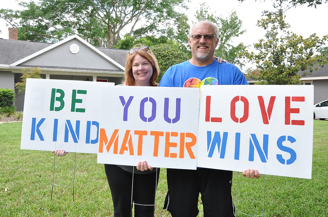 Leslie Williams and Greg Hartung took it upon themselves to send a message through yard signs.