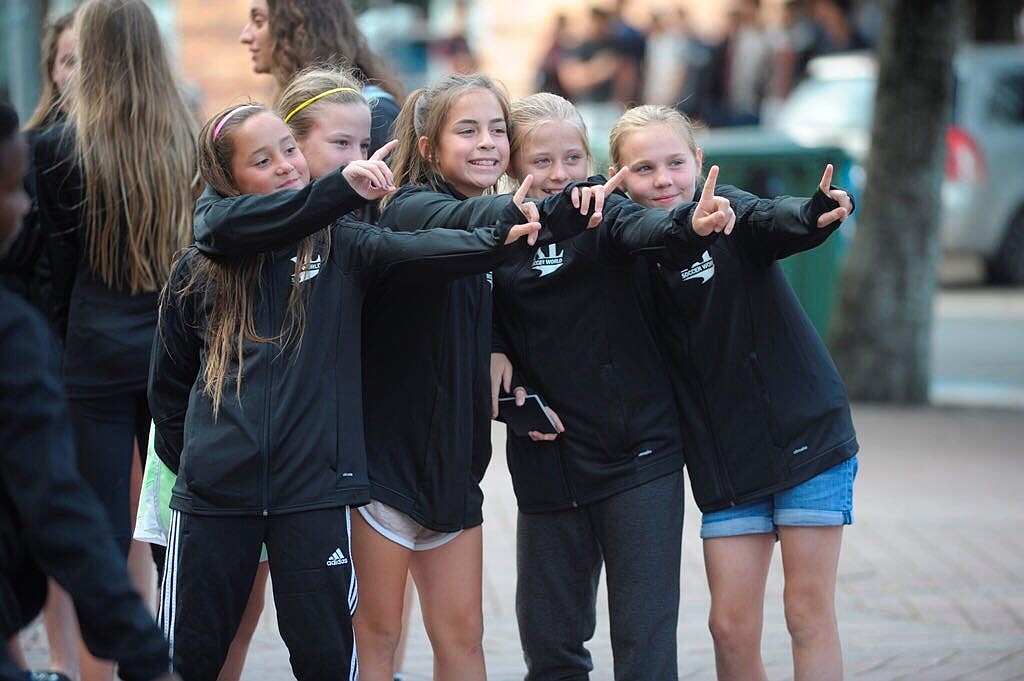 The girls from XL Soccer World Orlando â€” including Camila Dishinger, center, of Ocoee â€” stopped for a photo near Anoeta Stadium in Spain, where the opening night ceremonies of the Donosti Cup took place.