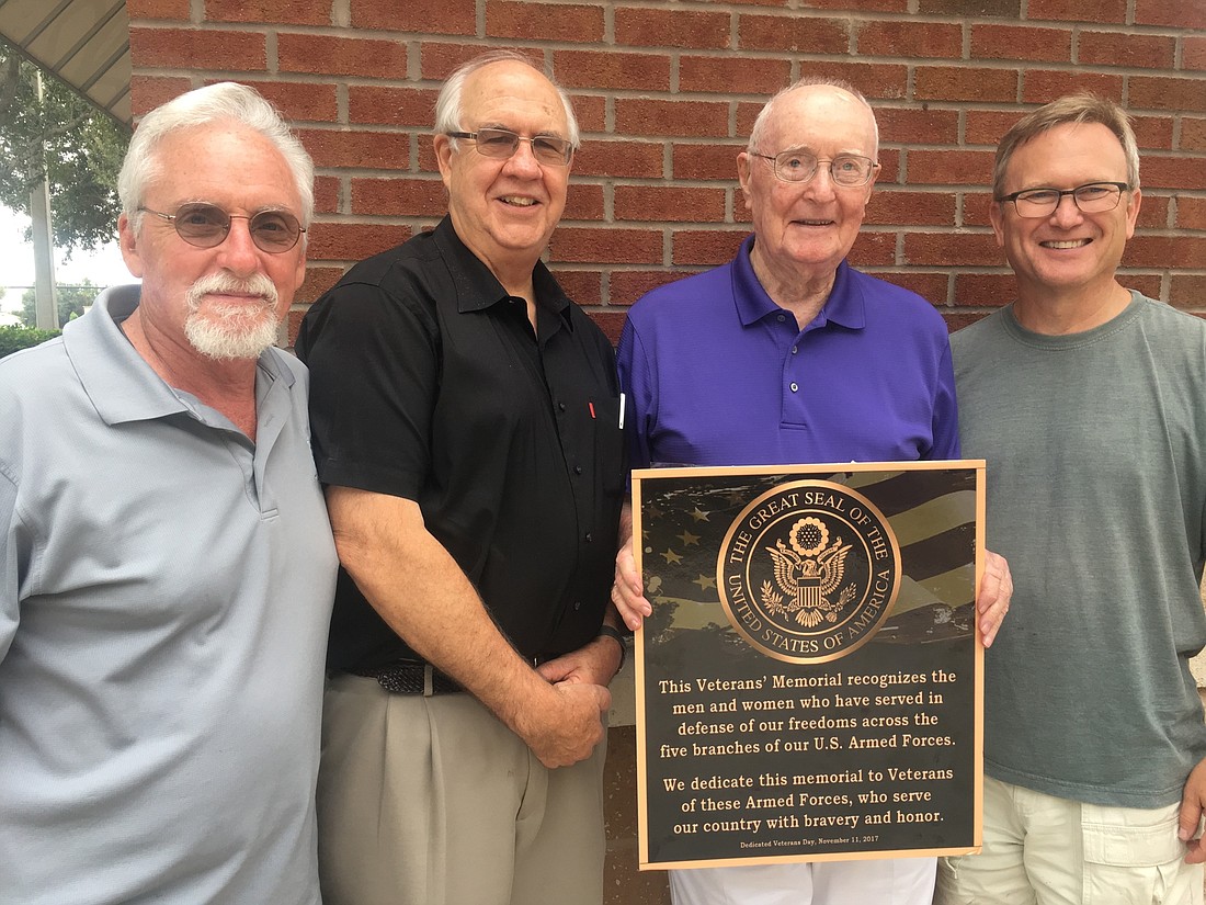 Stephen Fasen, left, Stephen Withers, Bill Criswell and George Poelker constitute the team behind the project.
