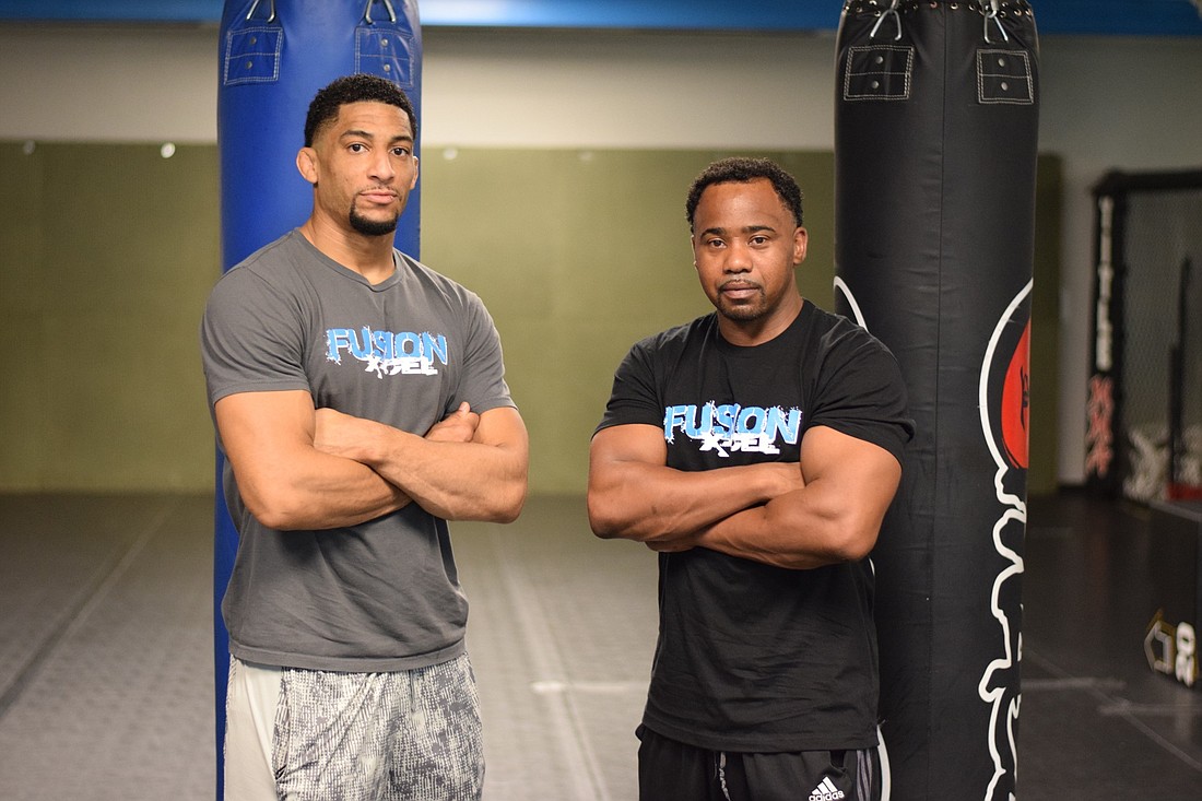 Julien Williams, left, and Edwin Carmichael are two of Fusion X-cel Performanceâ€™s owners. Williams is an MMA pro, while Carmichael is a personal trainer. Not pictured is co-owner and boxer James Taylor.