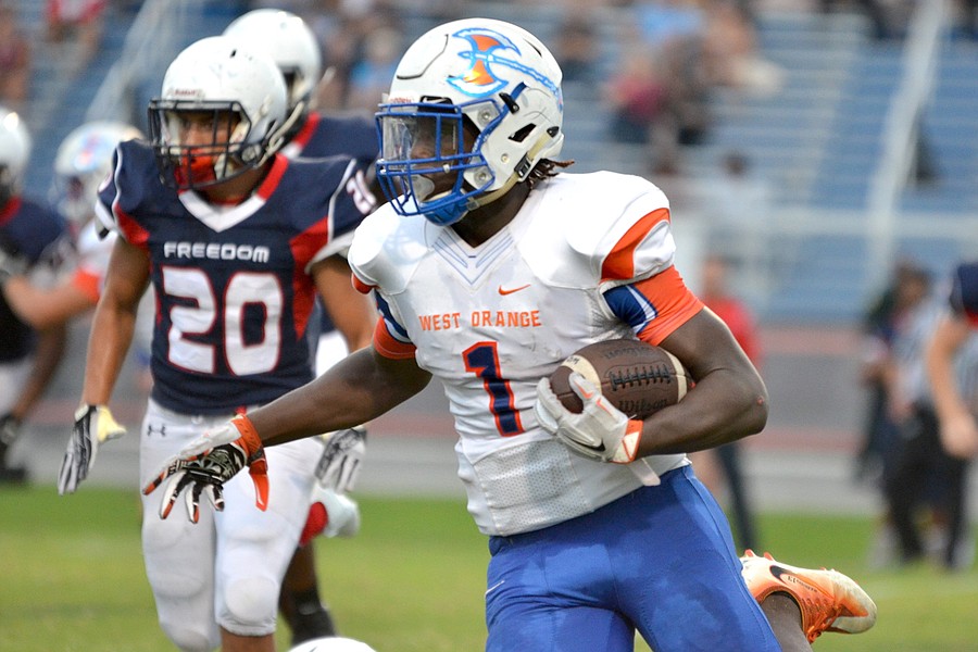 PHOTOS: West Orange football tops Freedom in weather-shortened game --  Observer Preps