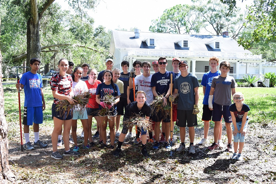 A group of students from Windermere Preparatory School had a blast singing along to Bon Jovi and Journey as they helped clean up around Windermere Town Hall.