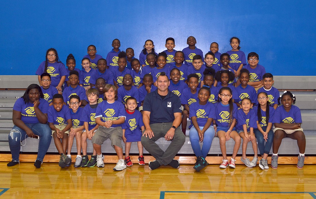 Major League Baseball standout Johnny Damon paused for a photo with children at the Boys & Girls Clubs&#39;s West Orange branch.