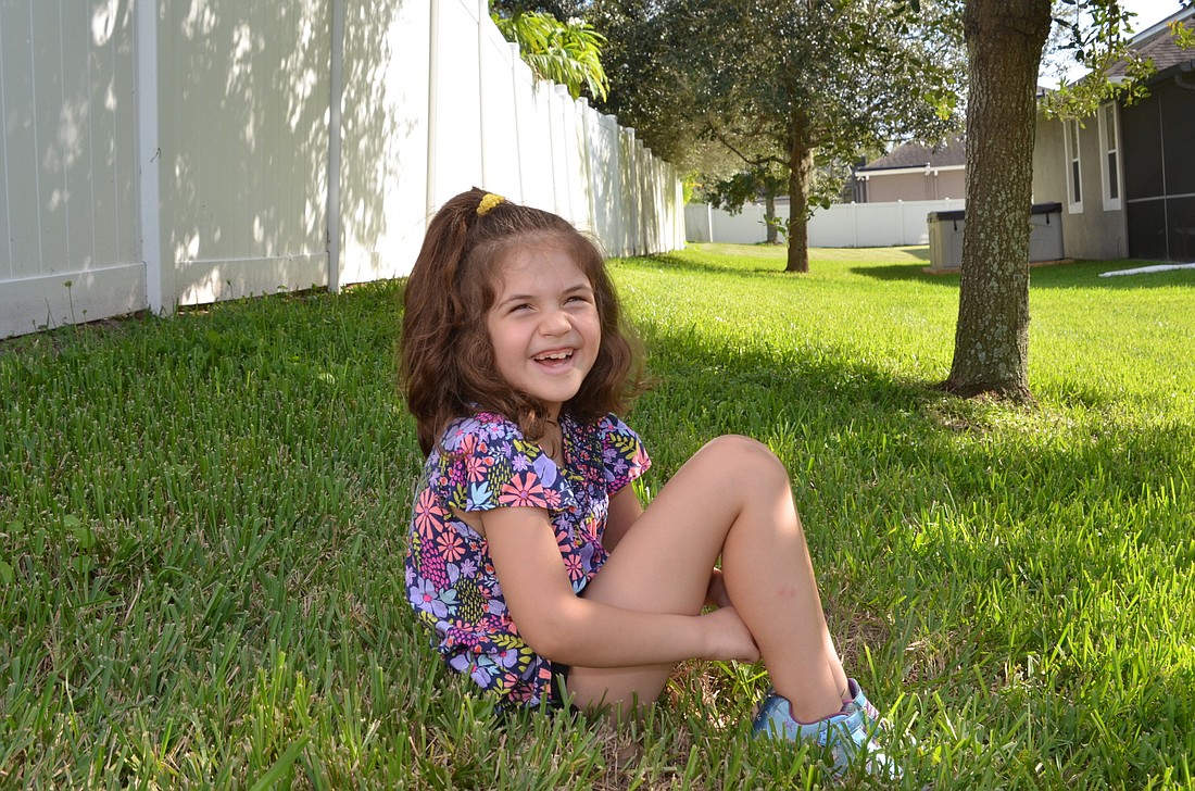 Melia Mullen&#39;s parents are raising money to get the 7-year-old an autism service dog.