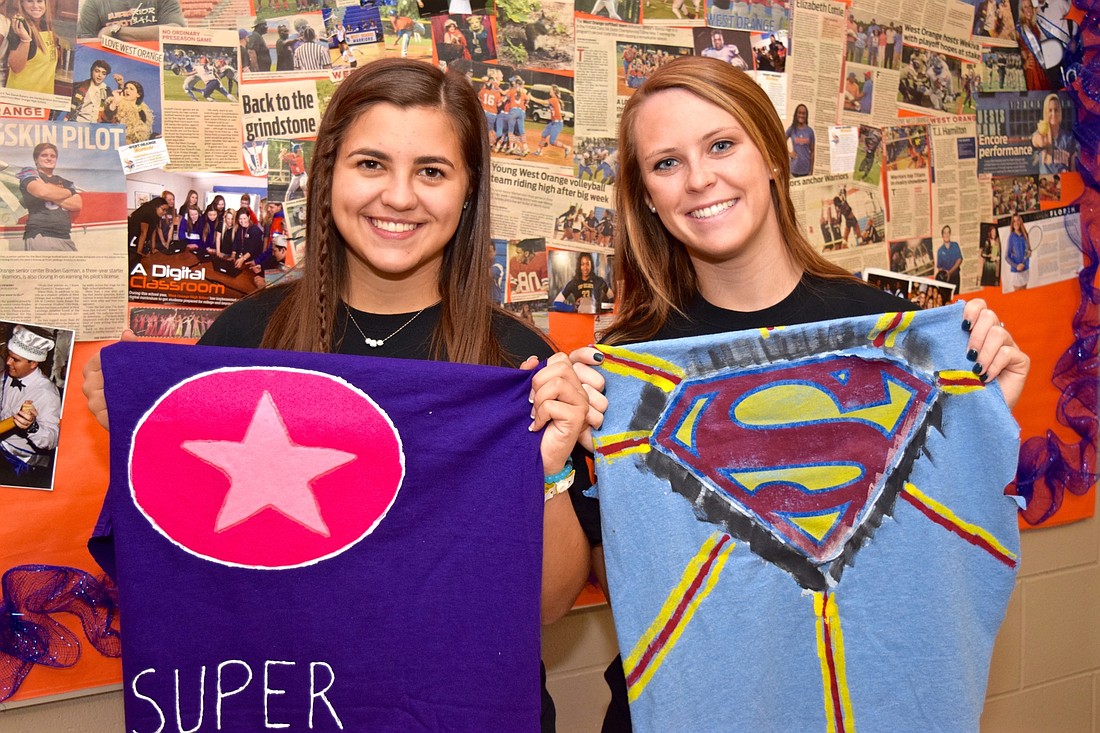 West Orange High seniors Delaney Dugger, left, and Abby Boeneman got the idea for the capes from a student-council conference hosted by Ocoee High.