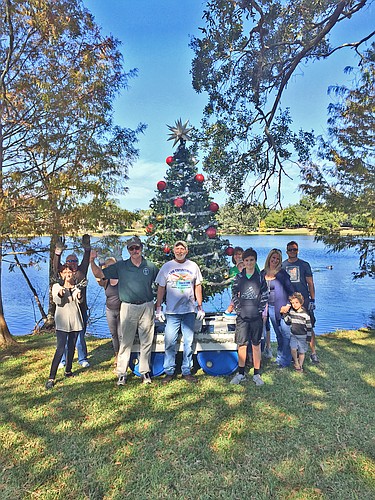 The Christmas tree floating on Lake Knowles was originally started by a garden club, but has since been carried on by a Winter Park neighborhood.