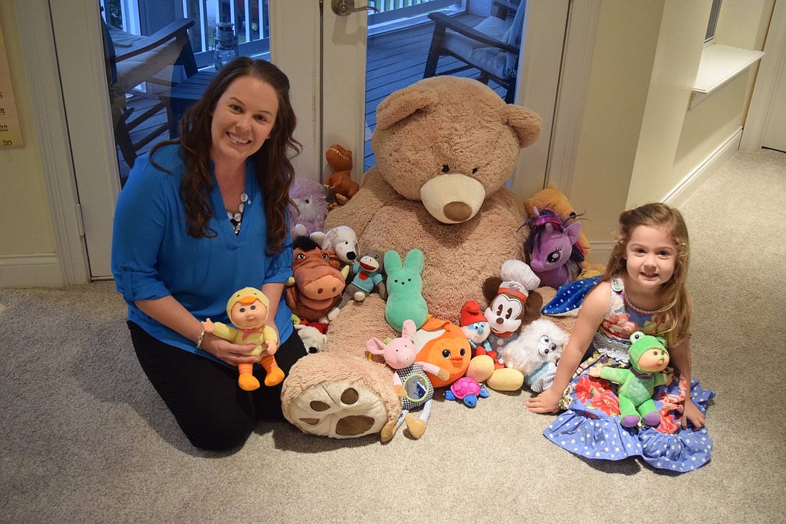 Angela Kuhn and her 3-year-old daughter, Callie, have collected about 250 stuffed animals so far to donate to the Florida Baptist Childrenâ€™s Home in Lakeland.