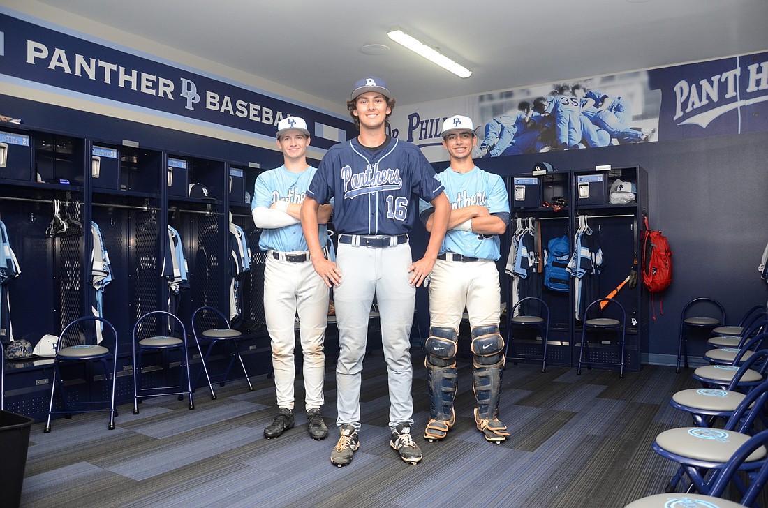 Dr. Phillips seniors August Haymaker, left, Cort Roedig and Sebastian Oetterer are excited that they will get to use the programâ€™s new locker room during their final season as high-school baseball players.