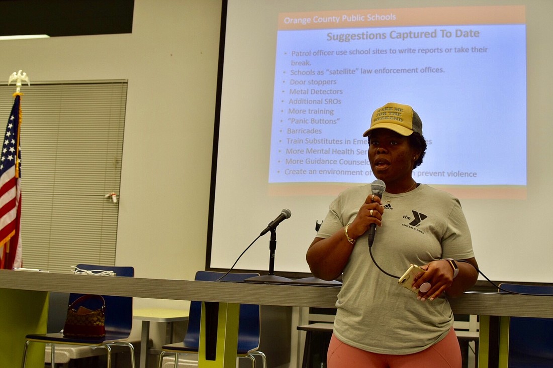 A parent offers suggestions and expresses safety concerns during the meeting.