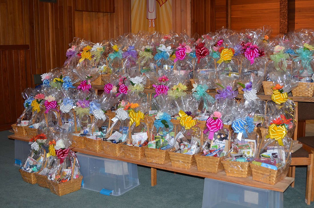 Baskets full of goodies for mothers are packaged, wrapped and waiting to be delivered from Oakland Presbyterian Church.