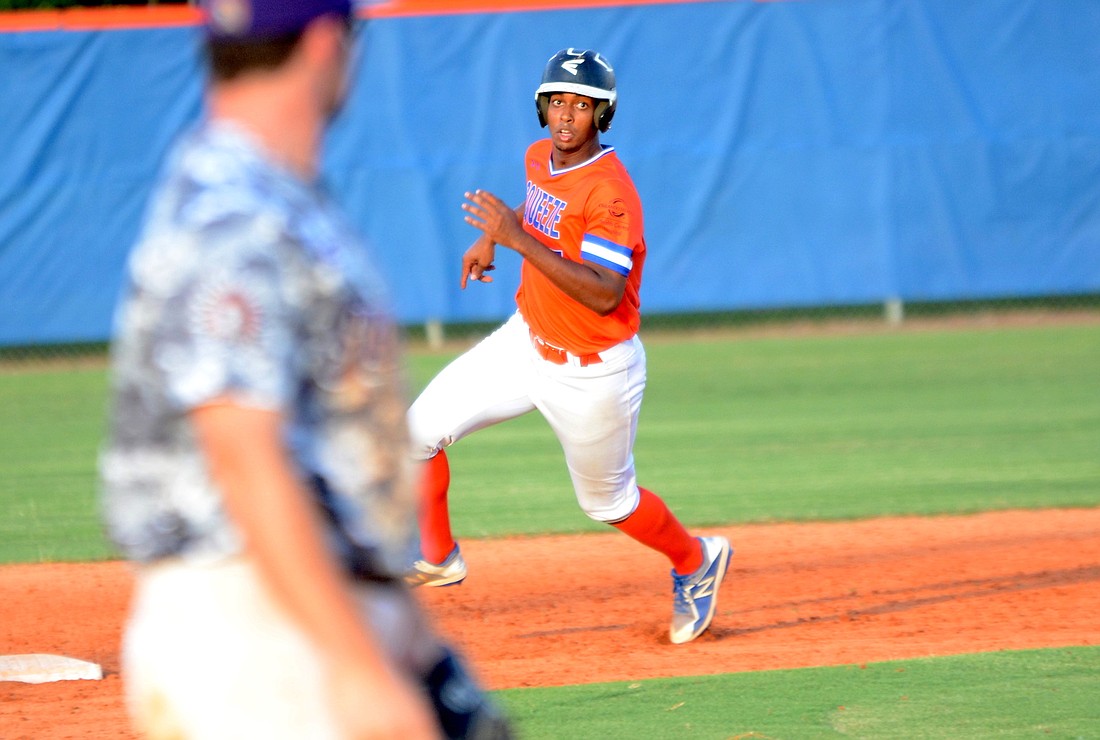 Olympia High alum Jordan Morrow rounds second base during the Squeeze&#39;s game June 2.
