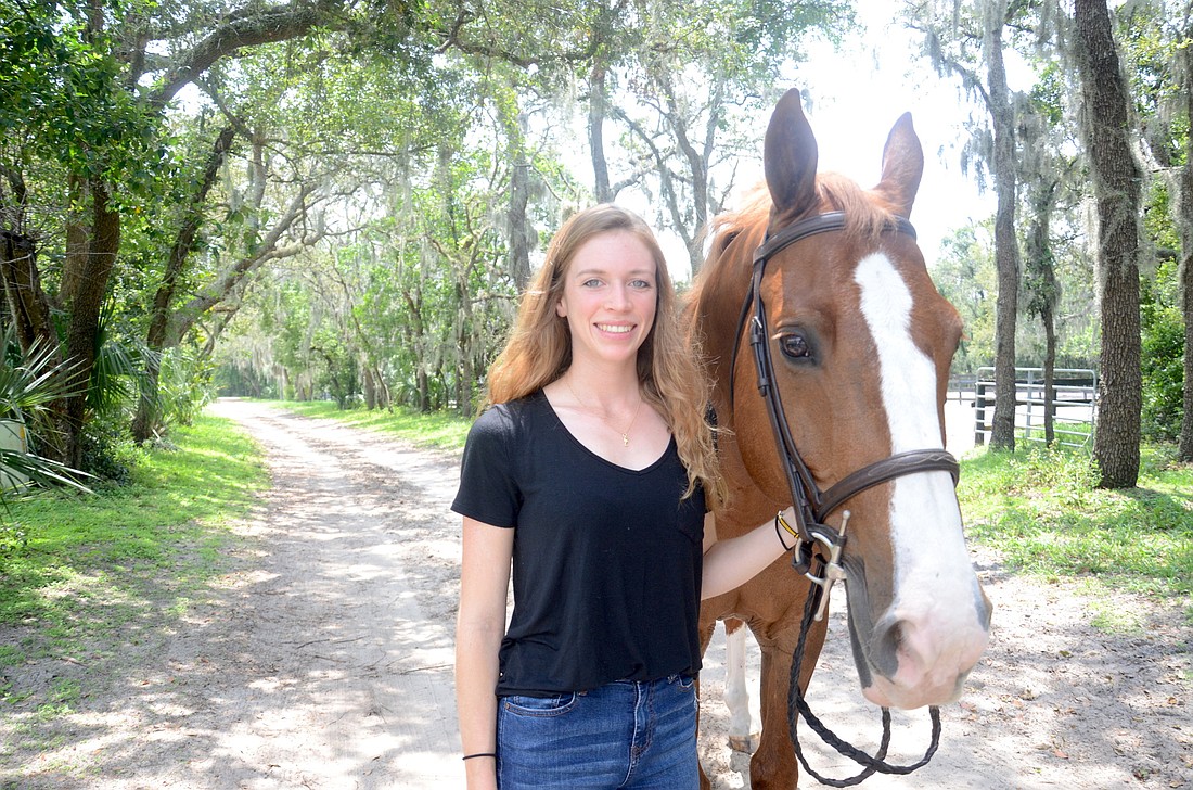 Molly Murtha and Gaston, one of the horses she trains with at Wendover Place.