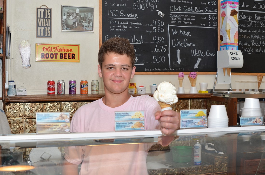 Riley Desin, a national ambassador for Shriners Hospitals for Children, has spent his summer dishing out cold treats at Scoops Old-Fashioned Ice Cream Store in downtown Winter Garden.